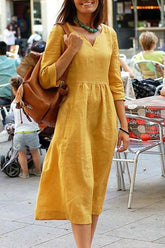 Vestido midi de lino con escote en V y siete mangas